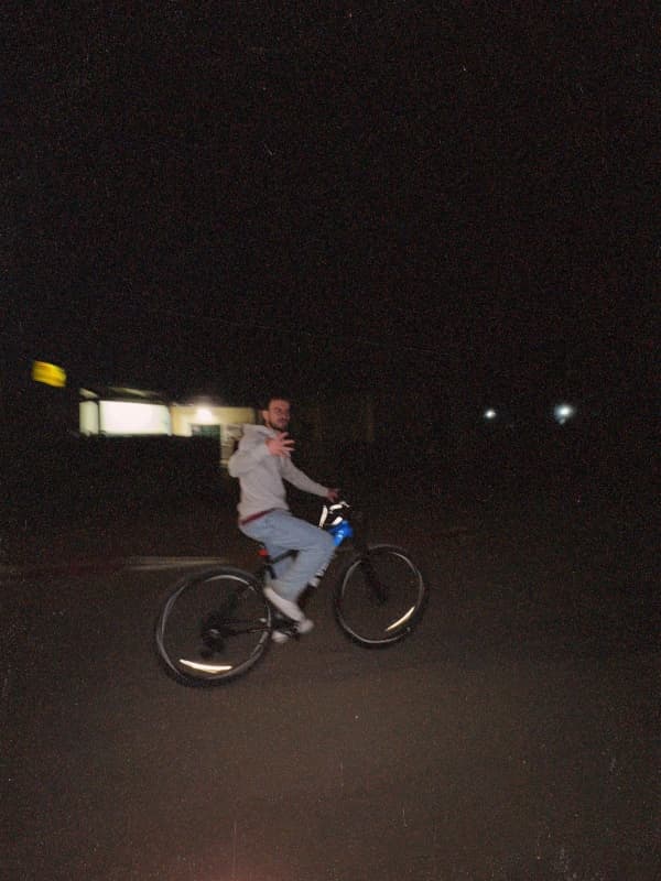 Riding to a party. With a bicycle. Onna highway.